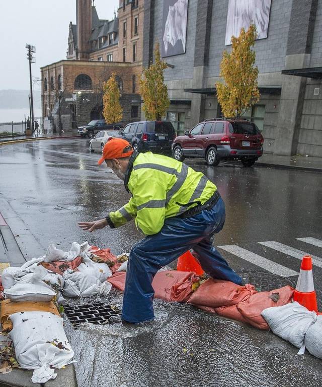 Worker Placing Sandbags