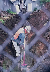 Man digging a ditch