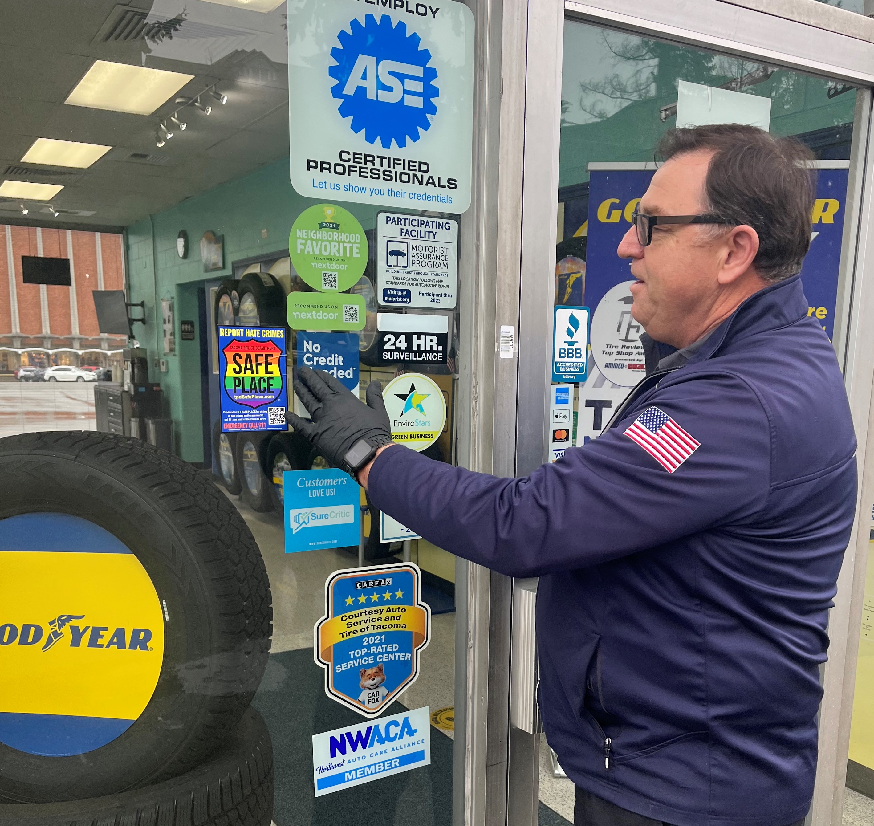 Photo of business putting up a Safe Place sticker